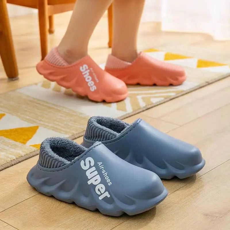 Slippers with waterproof online soles